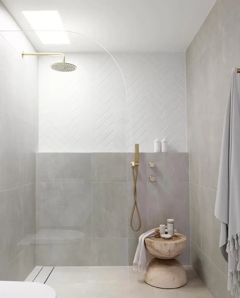 a minimalist side table will find its way in unusual places such as the shower and transform the space while still being practical.